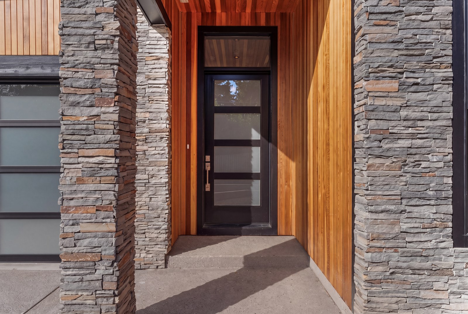 Cedar and stacked-stone entry detail