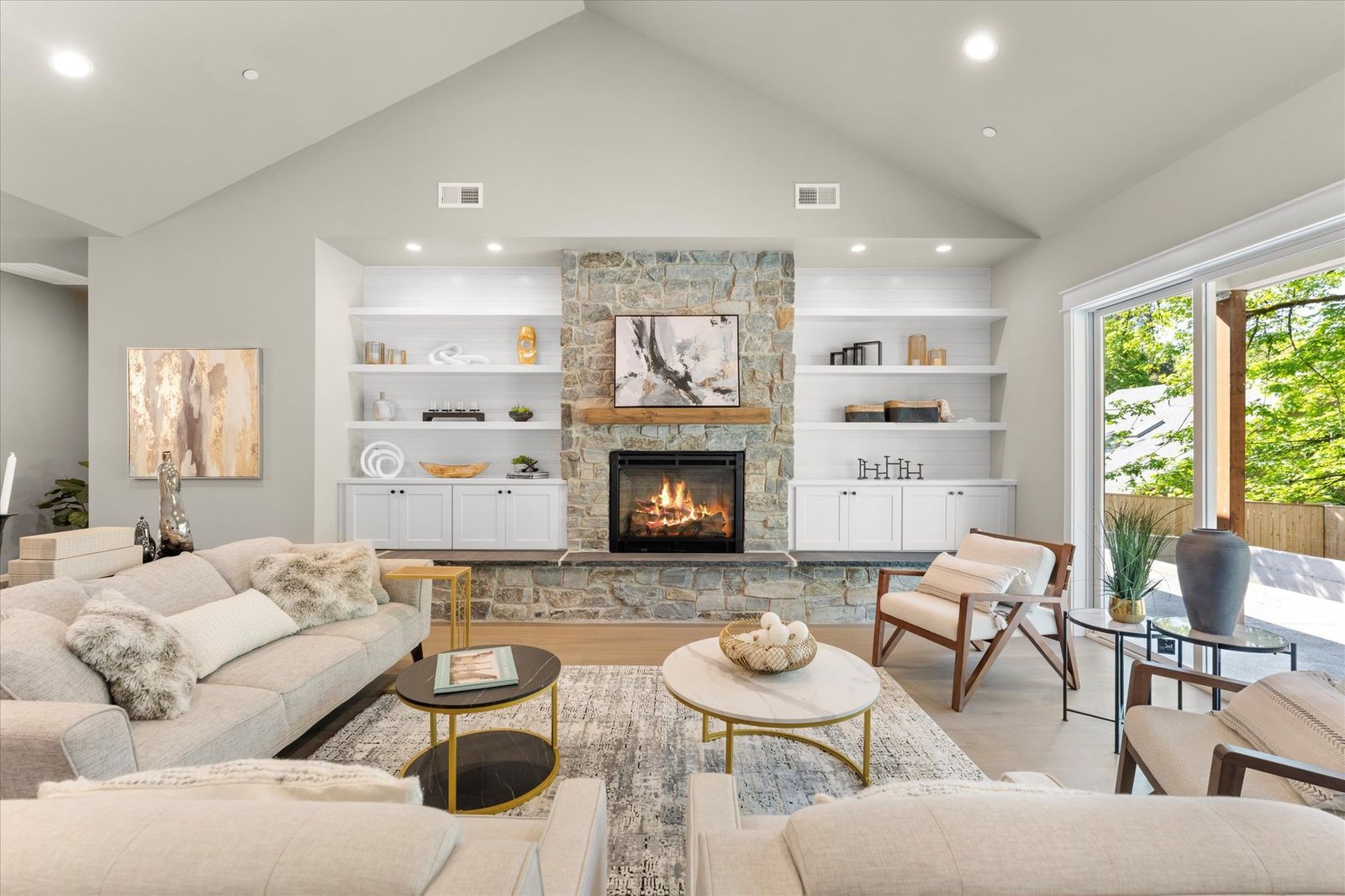 Living room with stone fireplace